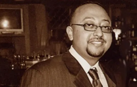 Henok Tesfaye at a community gathering